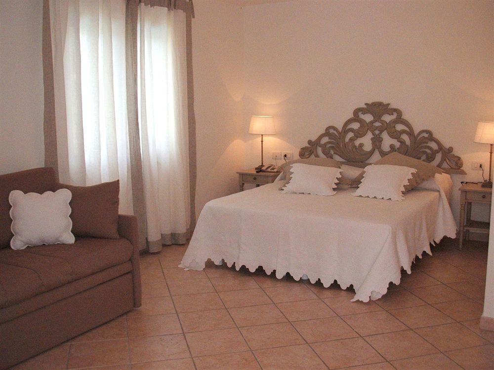 Relais Fenicottero Rosa Pensionat Porto Taverna Exteriör bild