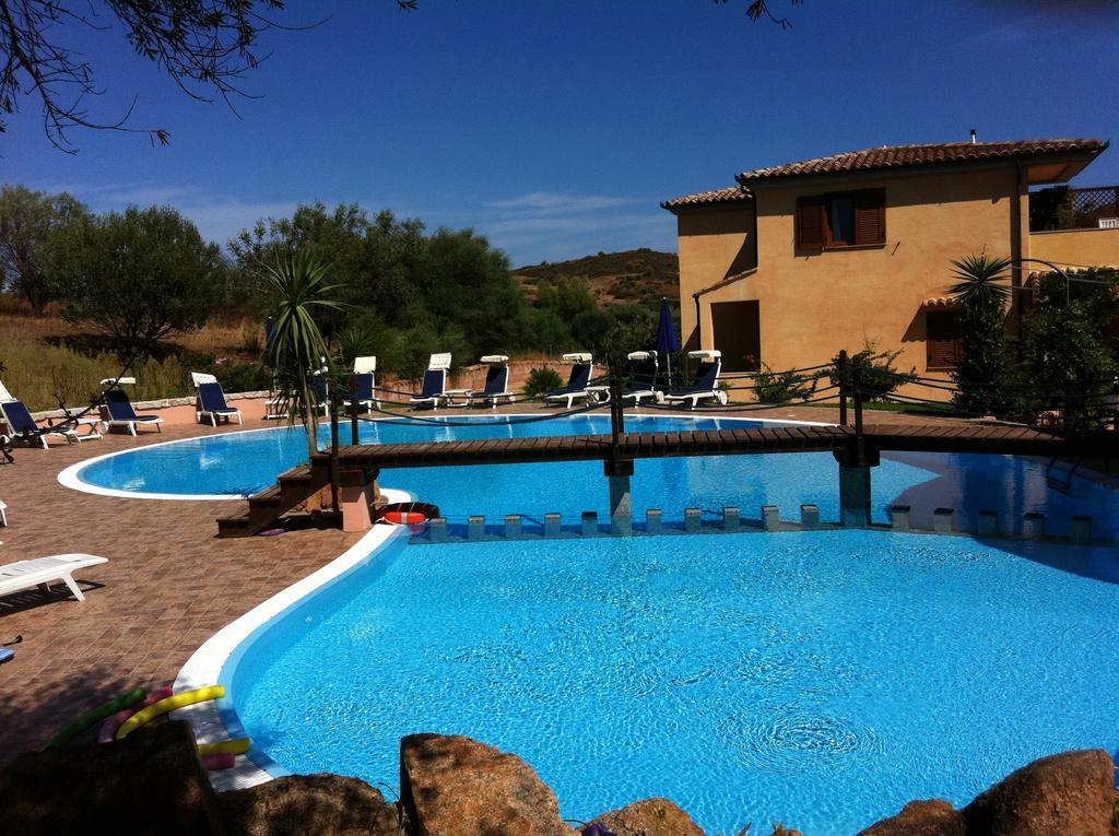 Relais Fenicottero Rosa Pensionat Porto Taverna Exteriör bild