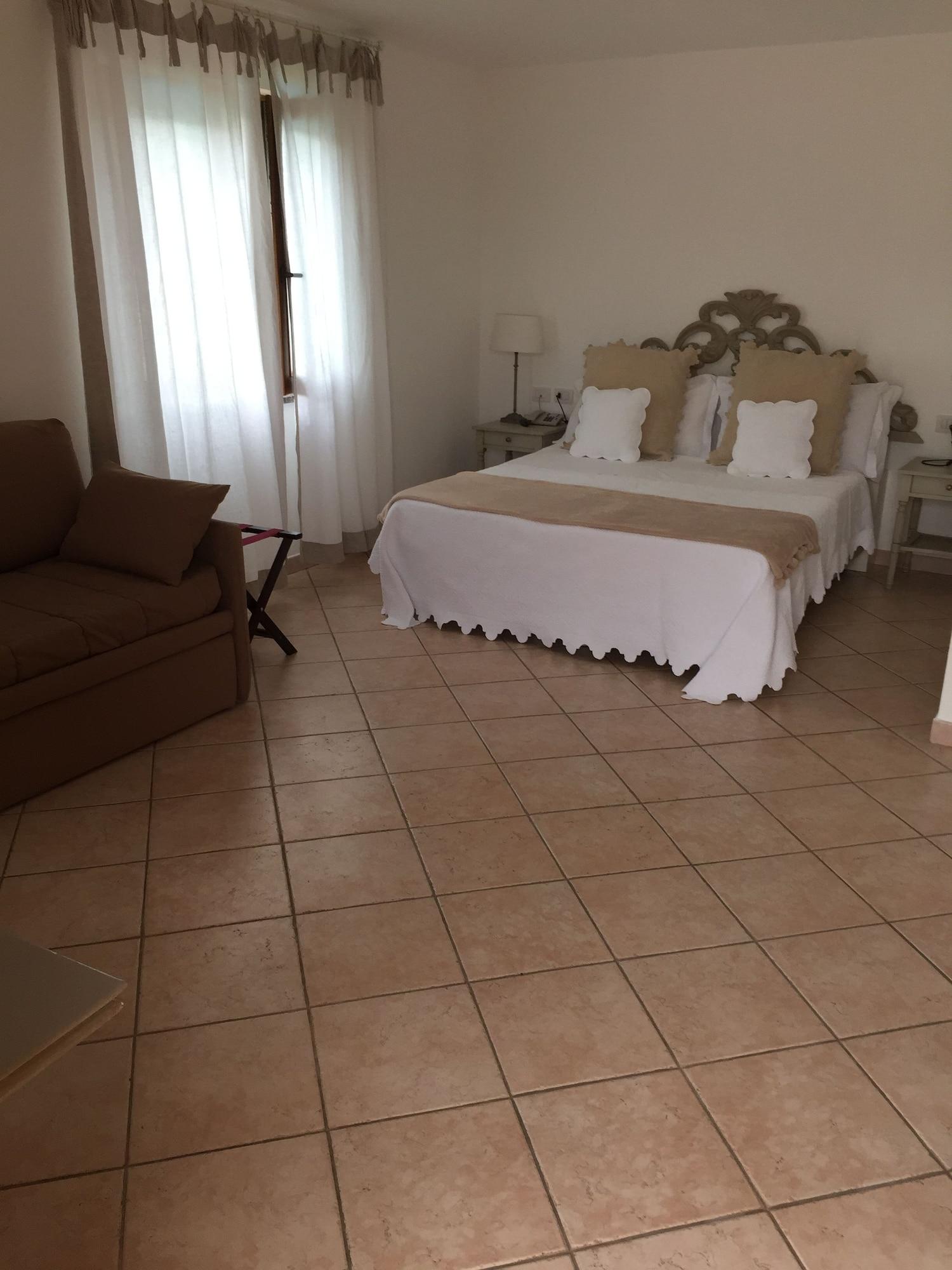 Relais Fenicottero Rosa Pensionat Porto Taverna Exteriör bild