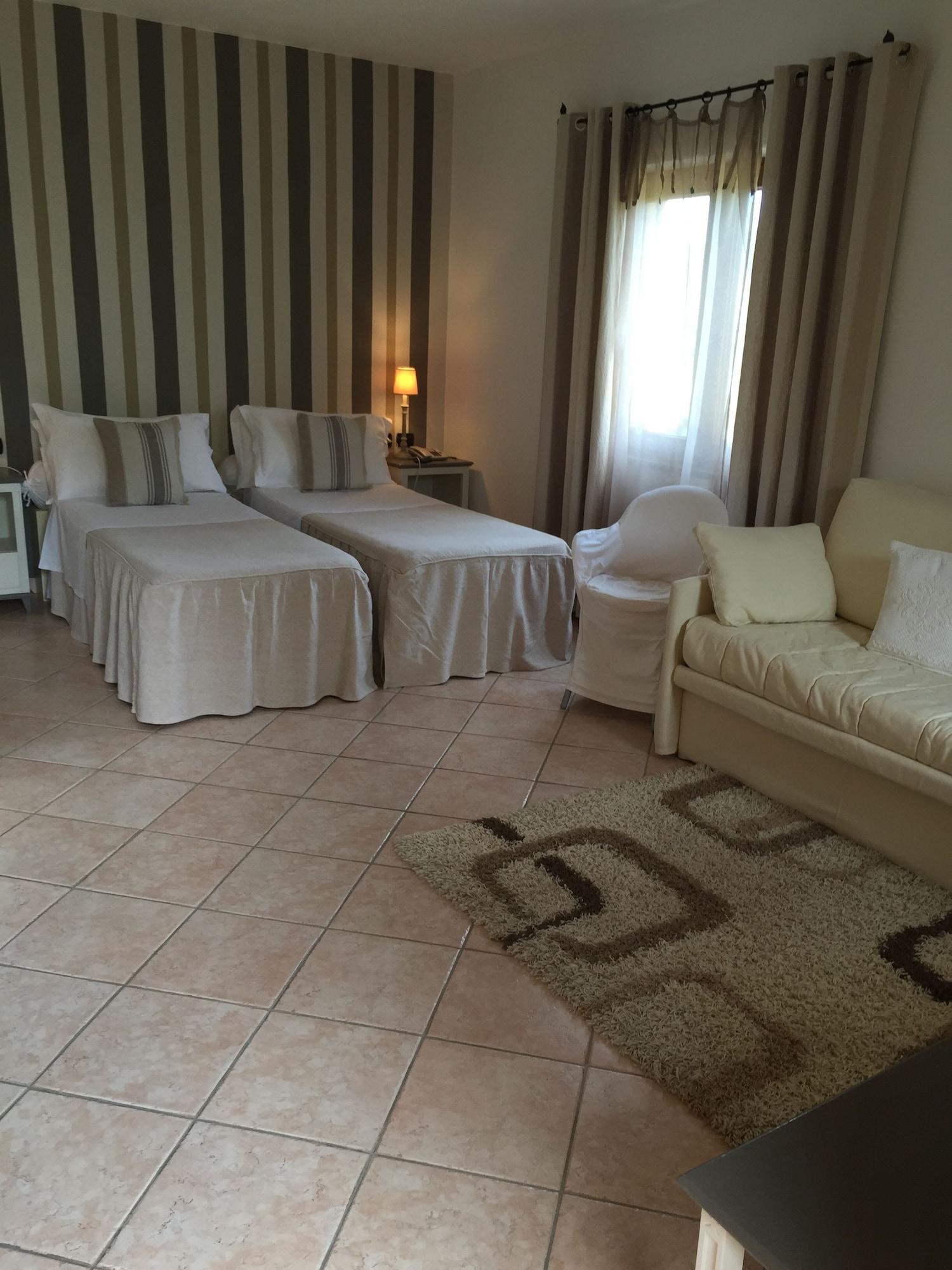 Relais Fenicottero Rosa Pensionat Porto Taverna Exteriör bild