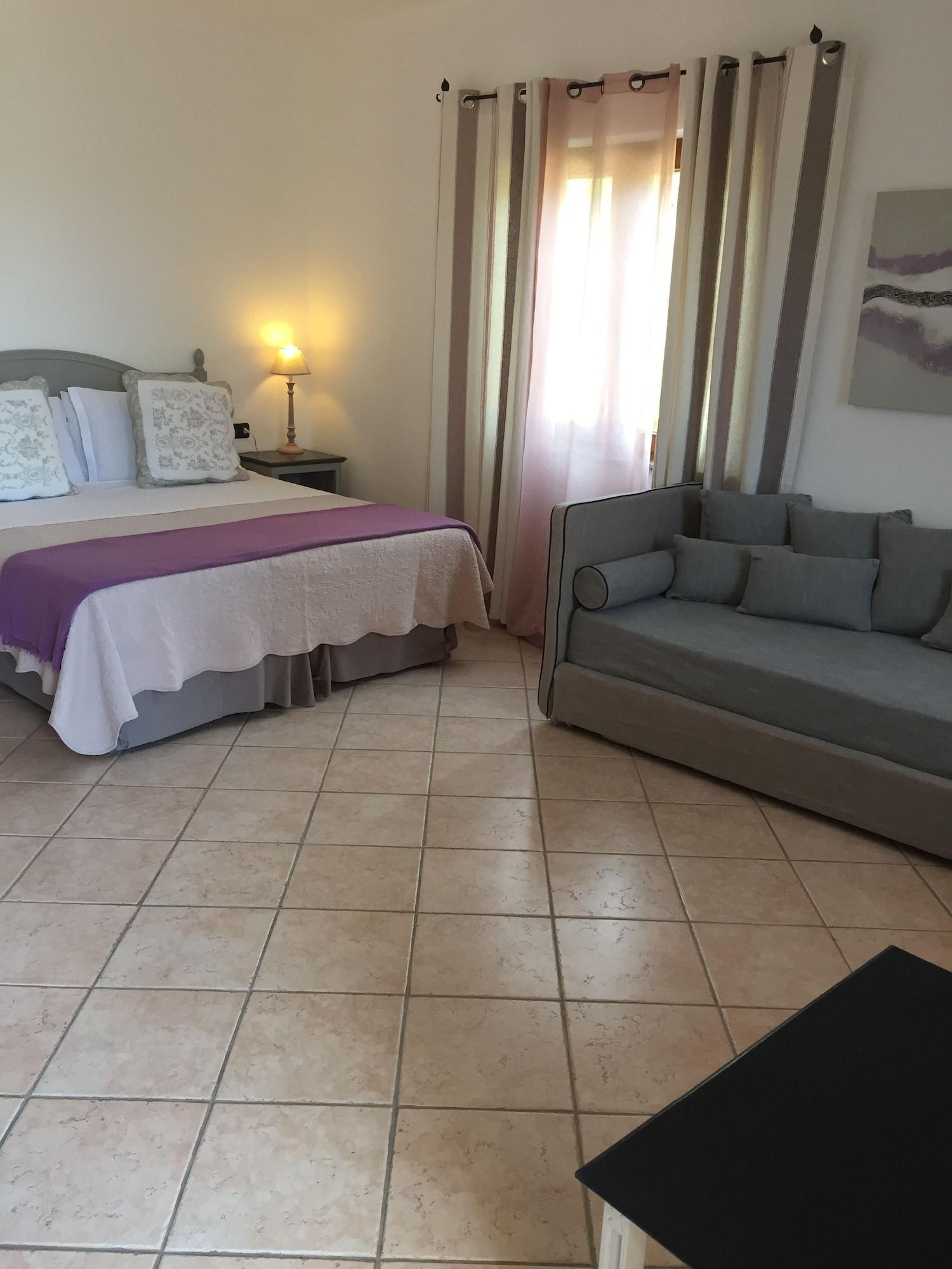 Relais Fenicottero Rosa Pensionat Porto Taverna Exteriör bild