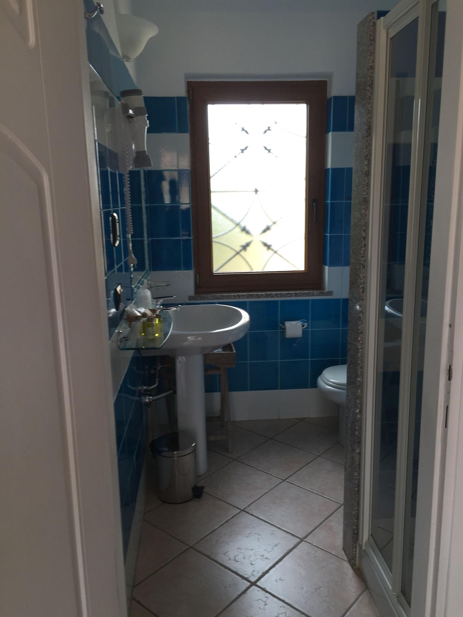 Relais Fenicottero Rosa Pensionat Porto Taverna Exteriör bild