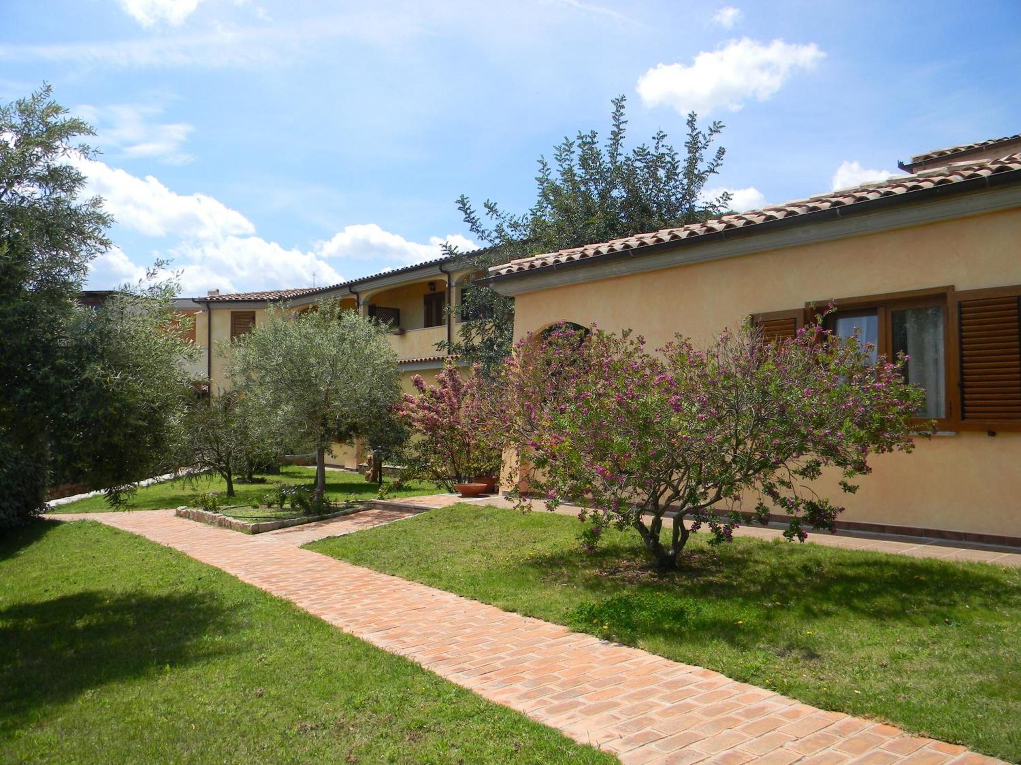 Relais Fenicottero Rosa Pensionat Porto Taverna Exteriör bild