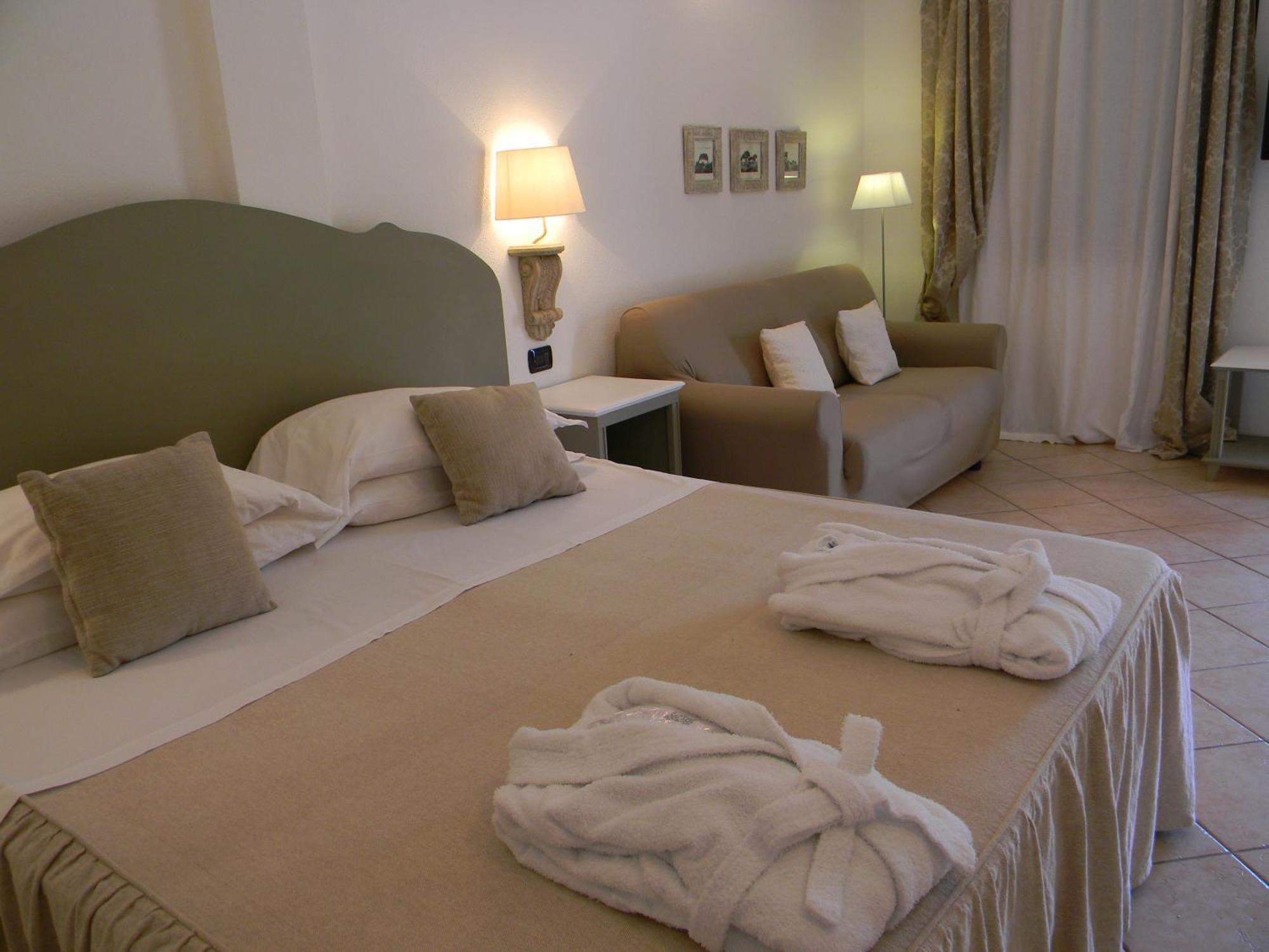 Relais Fenicottero Rosa Pensionat Porto Taverna Rum bild